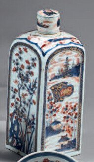 China porcelain bottle and lid. 18th century. Square shaped, flat lid, Imari decoration of lake landscapes with temples and flowery rocks interspersed with blue and gold reserves, landscapes on the shoulder, grit and small wears.