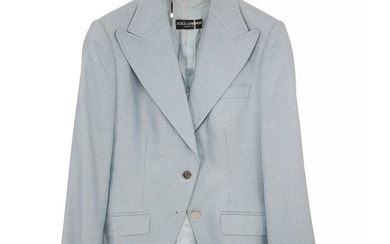 Dolce & Gabbana: A light blue blazer made of silk with two silver buttons, to padded pockets and light blue fabric lining. Size 46 (IT)