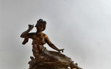 Early 20th century marble mantle clock with a gilded spelter figure of a reclining lady, white