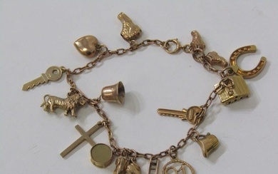 GOLD CHARM BRACELET, 9ct yellow gold bracelet set approx. 15...