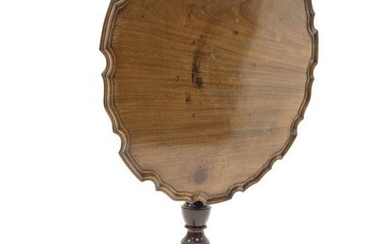 George III mahogany tripod table, circular moulded pie crust...