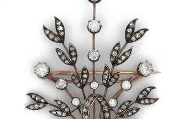 Gold and silver brooch forming a knot from which branches adorned with rose-cut diamonds and highlighted with larger, antique cut diamonds emerge. Weight of diamants : approximately 4.5 carats. Circa 1870. Dimensions : 4.5 x 6 cm. P. Brut : 18 g.