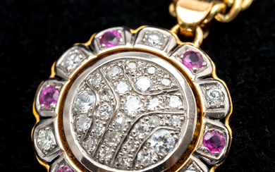 Gold necklace with pendant set with diamonds, zircons and pink sapphires.