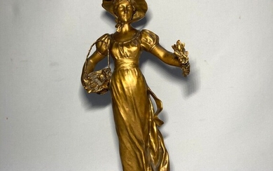 Gustavo OBIOLS DELGADO (1858-1910) Femme au panier de fleurs Bronze doré signé et marque "F....