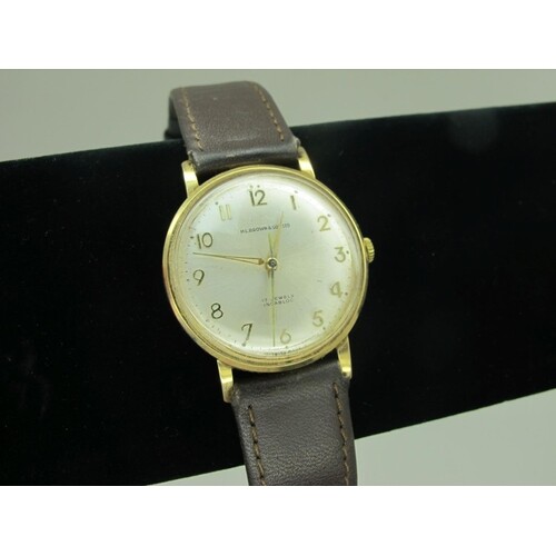H. L. Brown & Son Ltd; A 9ct Gold Cased Gent's Wristwatch, t...