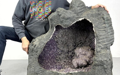 Huge Amethyst Brazilian Geode with druzy amethyst and calcite crystals