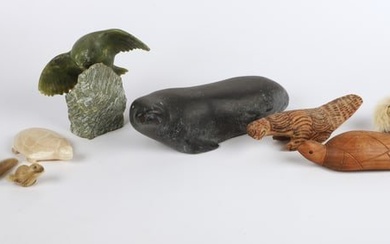 Inuit stone carvings and various animal figures
