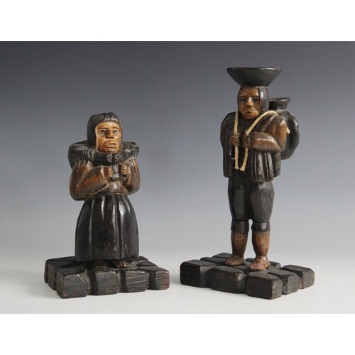 LATIN AMERICAN FOLK ART: Two carved and stained wooden figur...