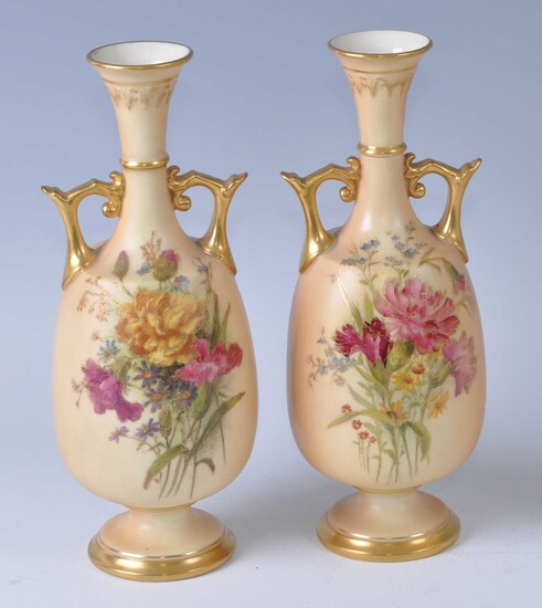 A near-pair of early 20th century Royal Worcester blush ivory porcelain vases