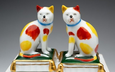 PAIR OF STAFFORDSHIRE PORCELAIN CATS.