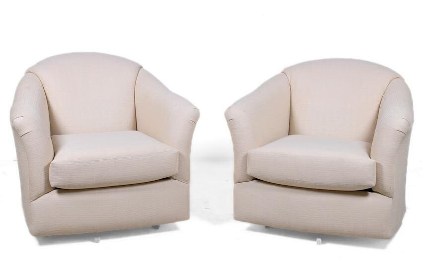 Pair Contemporary barrelback upholstered swivel lounge
