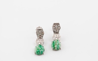 Pair of white gold (750) ear pendants formed of three articulated, hexagonal motifs, two paved with eight-eight-cut diamonds in grain-set, the third adorned with a carved and engraved green veined celadon jadeite plaque.