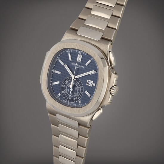 Patek Philippe Nautilus '40th Anniversary', Reference 5976/1G-001 | A white gold flyback chronograph wristwatch with diamond-set indexes, date and bracelet | Circa 2016