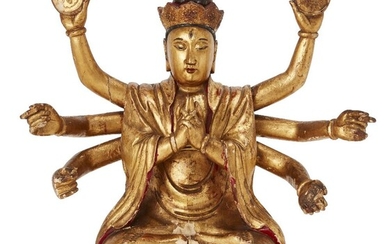 Property of a Gentleman (Lots 55-80) A large Chinese gilt-lacquered wood figure of eight-armed Guanyin, 18th century, seated in dhyanasana with principal hands clasped together at the chest and two raised arms holding discs inscribed with sun and...