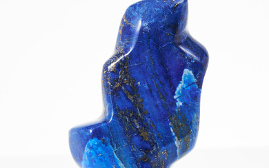 SCULPTURE, lapis lazuli, ground and polished in irregular shape.