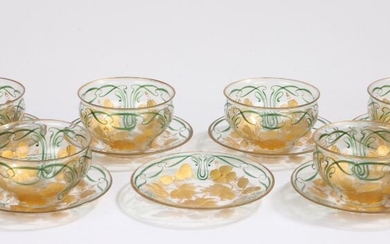 Set of six early 20th Century Art Nouveau glass dessert bowls and saucers, each with gilt wild