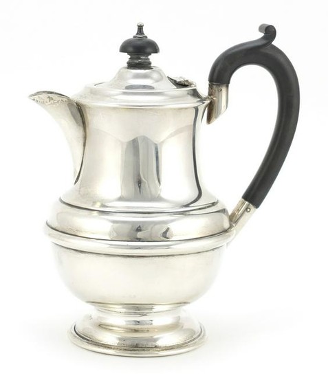 Silver hot water pot with ebonised handle and knop, AEJ