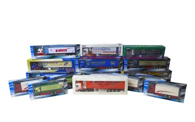 Sixteen die-cast model trucks by Cararama and Corgi, all wit...