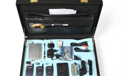 Spy Camera Kit combination briefcase containing three plastic cameras...
