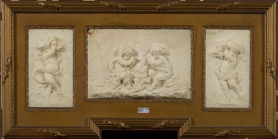 Suite of three carved white marble bas-reliefs depicting "Putti illustrating spring, autumn and winter". Presented in the same frame. Period: late 18th - early 19th century (?). (* and **). Size (bas-reliefs) : +/-18,3x10,4cm and 16x24cm.