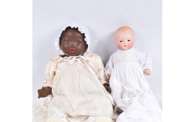 TWO ARMAND MARSEILLE BISQUE HEAD DOLLS, larger one with nape...