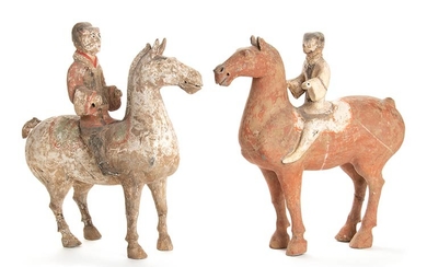 TWO PAINTED CERAMIC FUNERARY MODELS OF HORSES AND RAIDERS China,...