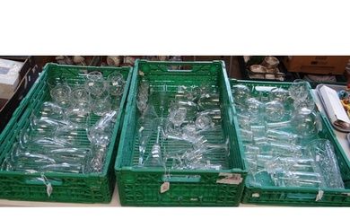 Three crates of glassware to include: champagne flutes, wine...