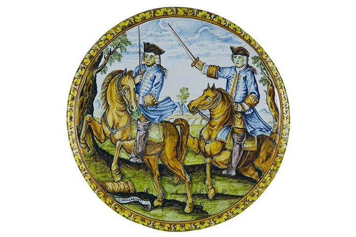 Tondo Round on board slightly enlarged. Maiolica painted in polychromy;...