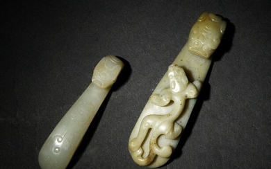 Two Chinese Jade Dragon Hooks, Ming and Qing Dynasty