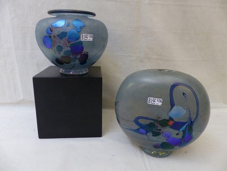 A ball vase and an ovoid blown glass vase with...
