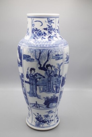 White blue Chinese porcelain vase decorated with court scenes in storerooms.