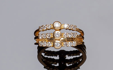 Yellow gold ring with three arms in a row...