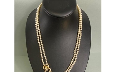 cultured pearls with 18ct gold and Diamond clasp, double str...