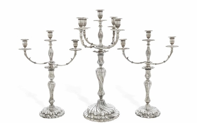 A PAIR OF GEORGE II SILVER CANDLESTICKS, A MATCHING PAIR OF VICTORIAN SILVER BRANCHES AND A VICTORIAN SILVER FIVE-LIGHT CANDELABRUM, MARK OF FREDERICK KNOPFELL, LONDON, 1758, ONE BASE WITH MARKS OBSCURED, ONE SOCKET WITH MARK OF SIMON LE SAGE, THE...