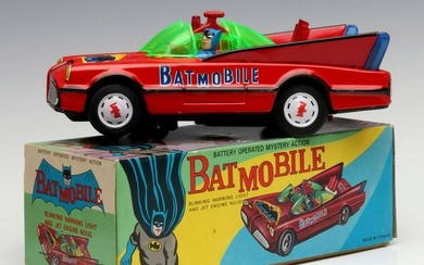 A BATTERY OPERATED MYSTERY ACTION BATMOBILE IN BOX