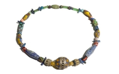 A BEADED NECKLACE Restrung, formed of several different
