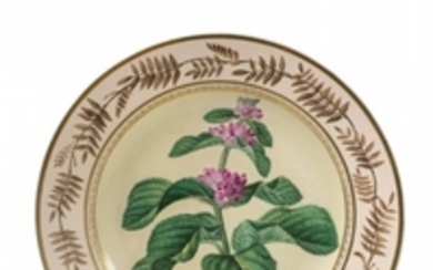 A Berlin KPM porcelain plate with a botanical ...