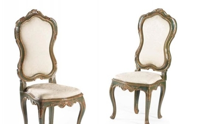 A set of eight Italian parcel gilt and green painted chairs