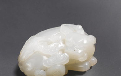 A white jade carving of a luduan