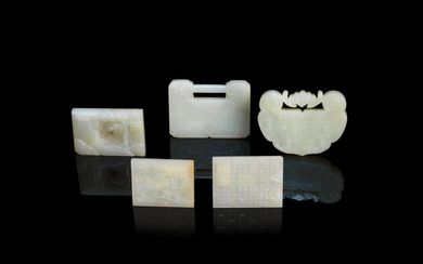A group of five pale green and white jade plaques