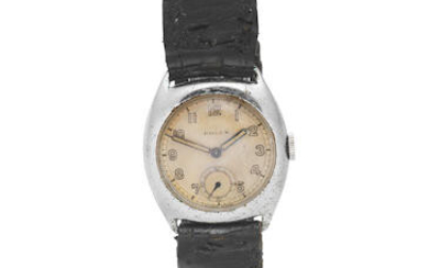 Rolex. A mid-size stainless steel manual wind tonneau form wristwatch