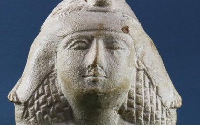 An Egyptian limestone male head
