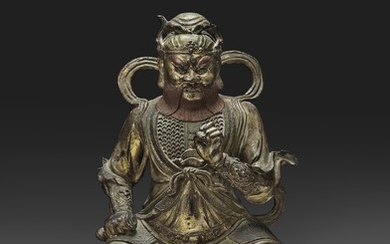 A LARGE GILT-LACQUERED BRONZE FIGURE OF A DAOIST DEITY, MING DYNASTY (1368-1644)