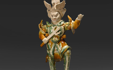 A large sancai-glazed pottery guardian figure