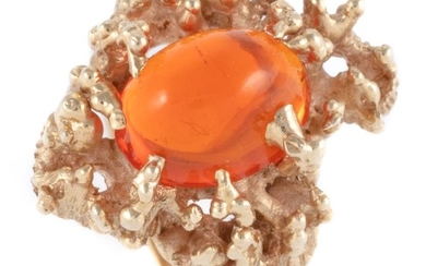 A 14CT GOLD FIRE OPAL RING; featuring a 5 x 7mm cabochon fire opal set in an organic mount, size K, wt. 7.38g.