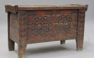 A 19th century Eastern European wooden trunk with overall incised decoration, height 75cm, width 115