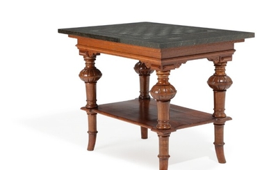 A 19th century darkpolished oak table, polished granite top with chess game. H. 73. L. 94. W. 68 cm.