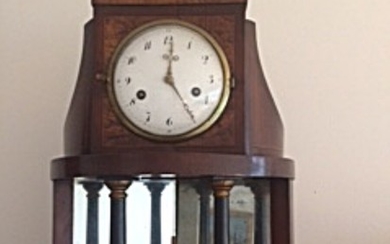 A 19th century mahogany mantel clock. H. 46 cm. W. 36 cm. D. 17 cm.