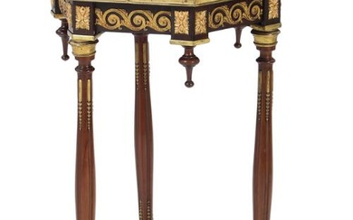 A 20th century Louis XVI style walnut side table, richly decorated with...