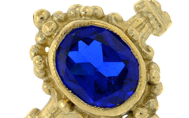 A 9ct gold blue synthetic spinel ring with beaded detail.